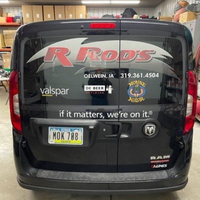 back of vehicle with RRods logo on window